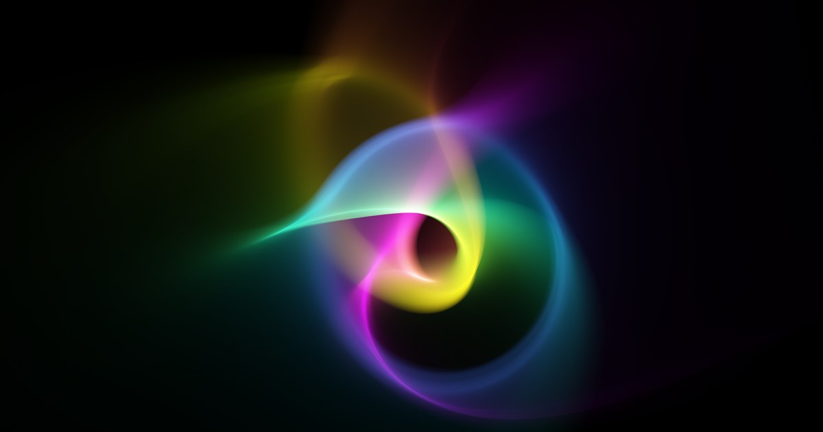 The Hopf fibration: nested
       luminous rings in yellow, magenta and blue on black.